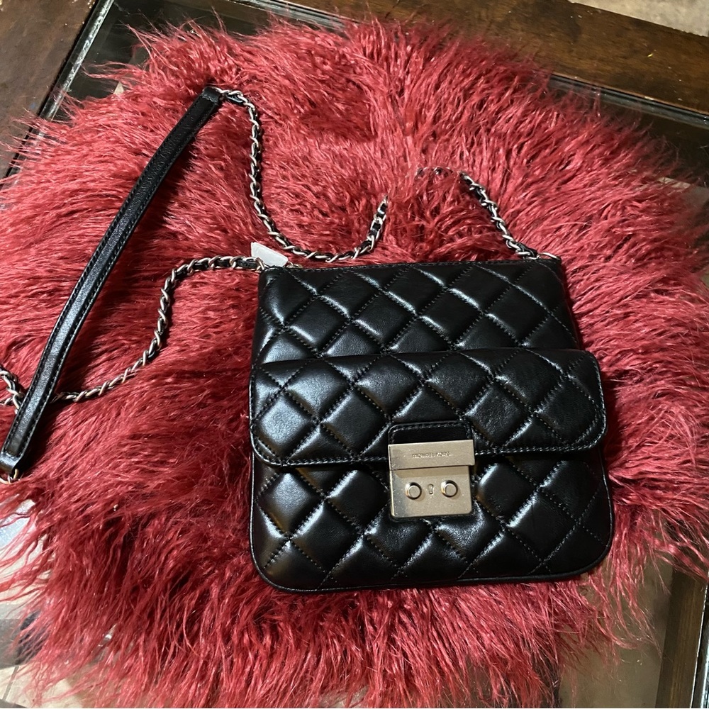 Michael Kors Black Quilted Satchel with Three Compartments for storage